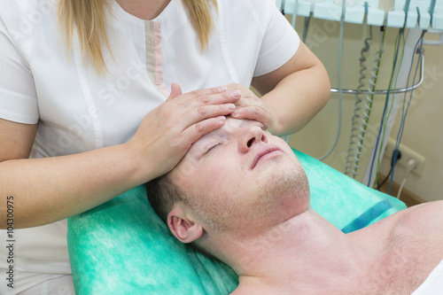 man in the mask cosmetic procedure in spa salon