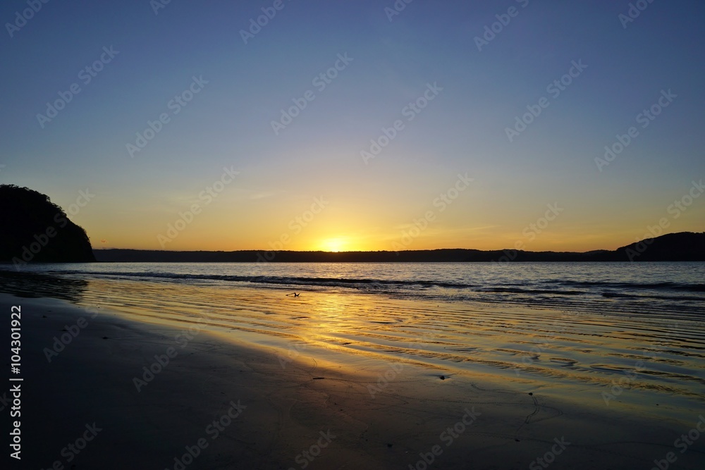 Sunrise over the Playa Blanca beach in Peninsula Papagayo in Guanacaste, Costa Rica