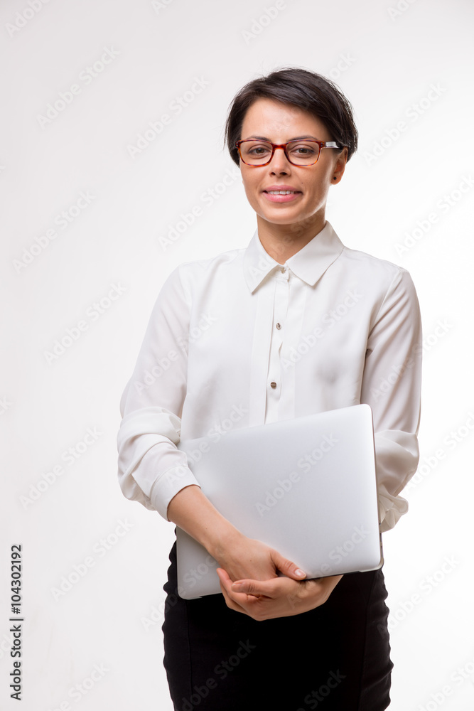 Young attractive business woman in a studio Young attractive business woman in a studio