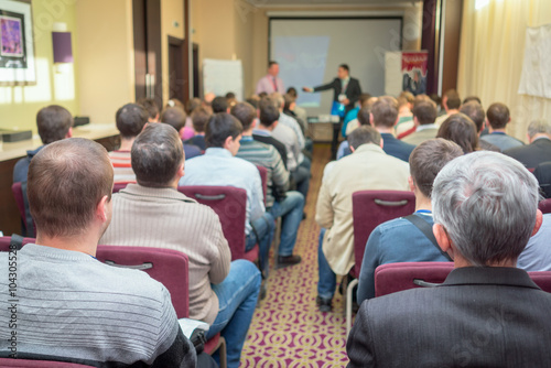 Meeting in a conference hall.