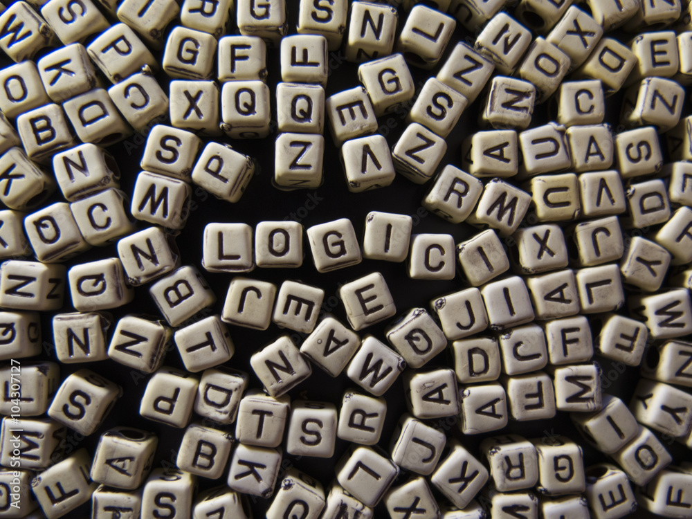 word LOGIC, of white cubes with black letters, English alphabet word LOGIC, of white cubes with black letters, English alphabet