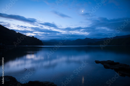 Dramatic sunset over Marlborough Sounds in New Zealand