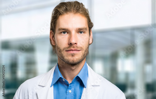 Portrait of a handsome doctor © Minerva Studio