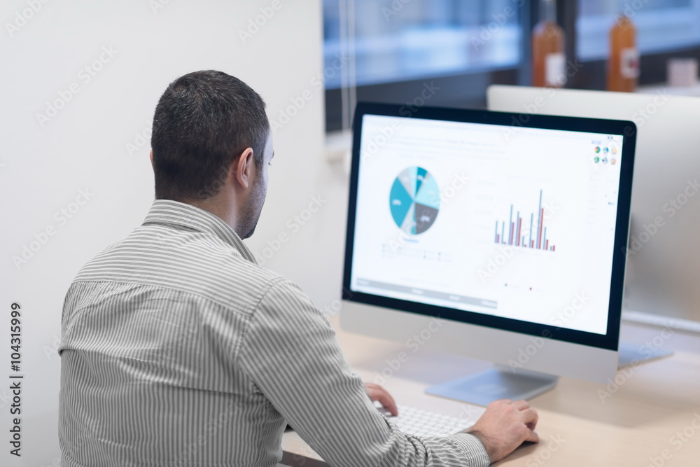 startup business, software developer working on computer