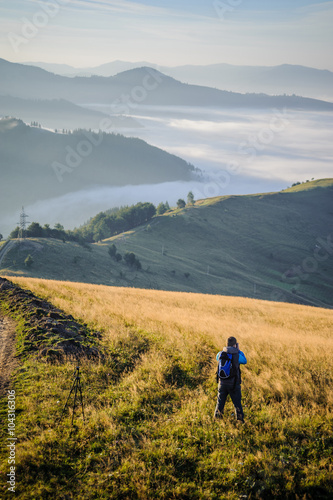 young man photographed in the mountains