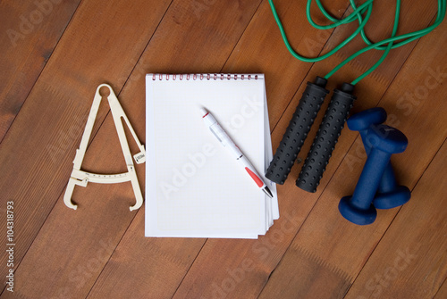 different street workout objects on the brown wooden table