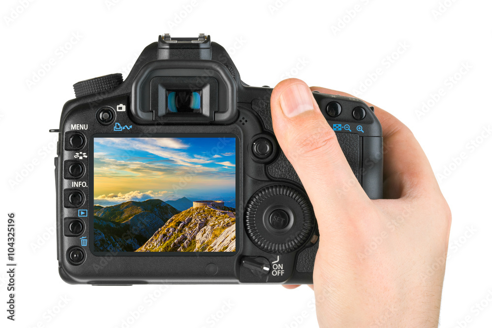 Hand with camera and Lovcen Montenegro image (my photo) Hand with camera and Lovcen Montenegro image (my photo)