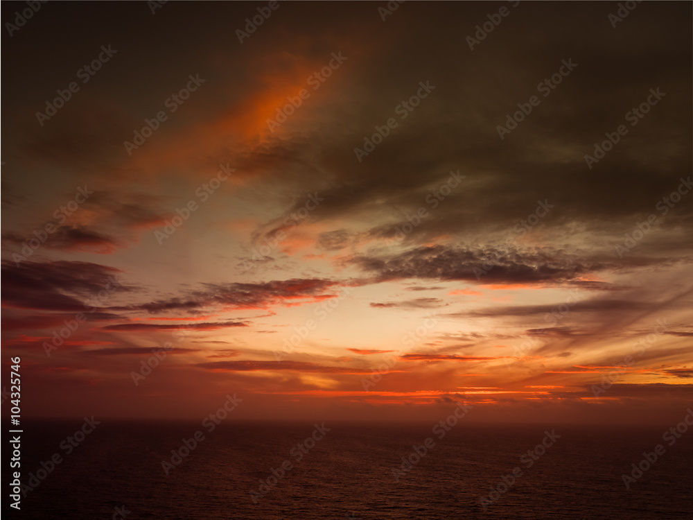 Sunset over the ocean - obrazy, fototapety, plakaty 