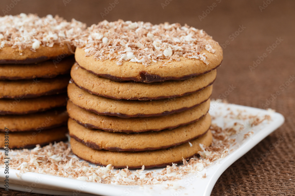 Round cookies with chocolate in a plate Round cookies with chocolate in a plate
