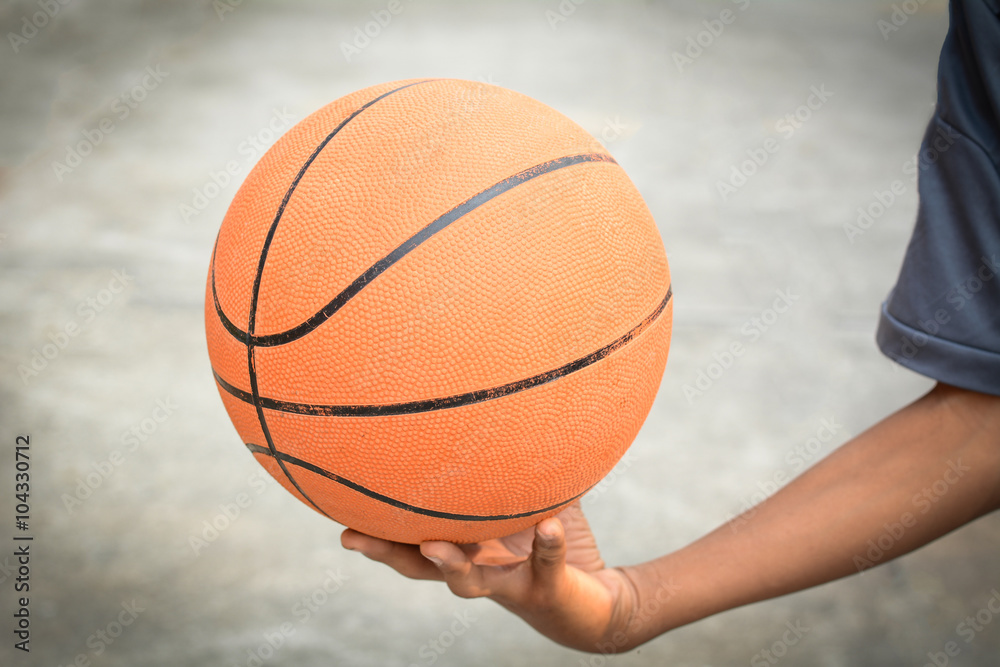 Basketball in human hand
