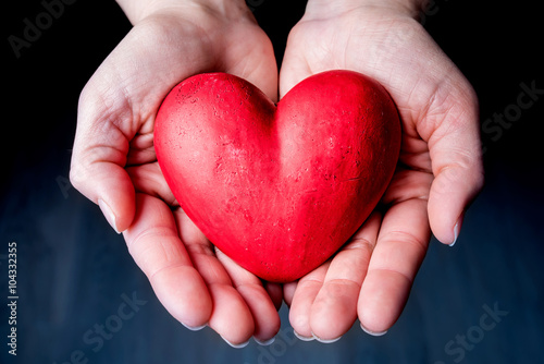 Red Heart on the Palm - Love Symbol