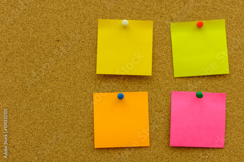 Color note paper with color pin on the cork board