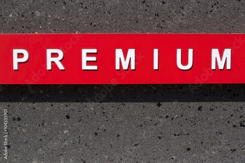 Word 'premium' written in white letters on red background