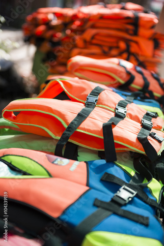 pile of many life jackets