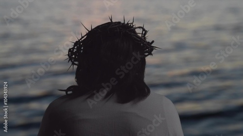 Jesus with crown of thorns on head in slow motion