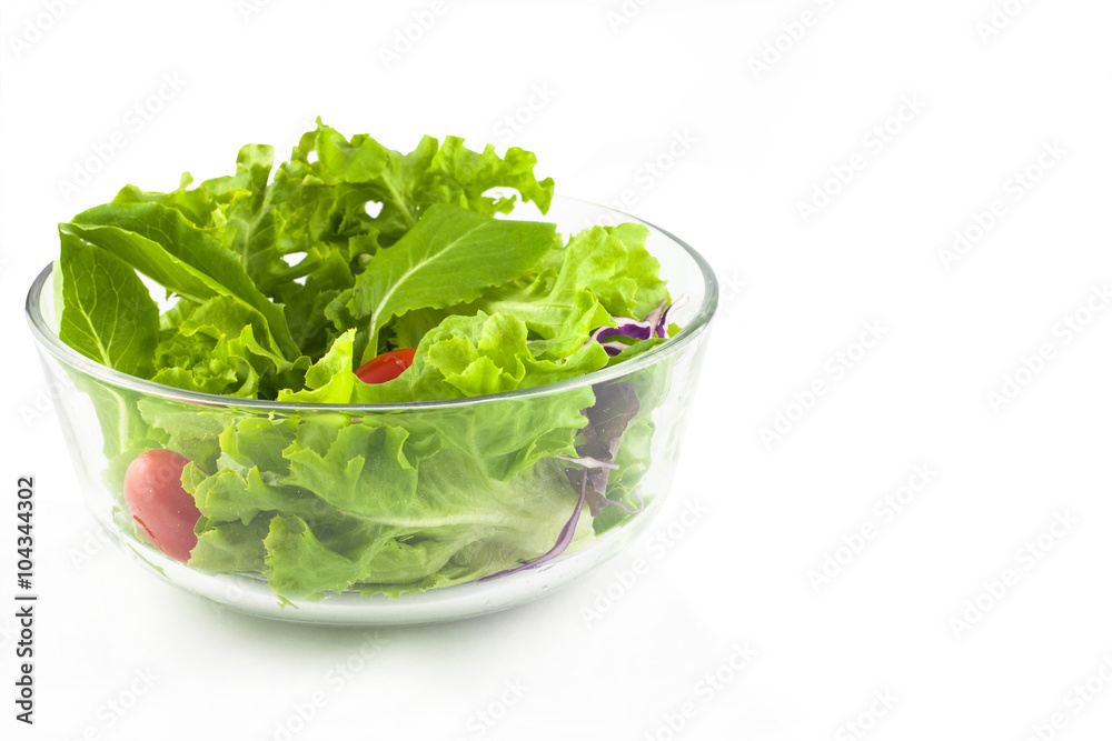 fresh spring green salad with lettuce in glass bowl fresh spring green salad with lettuce in glass bowl