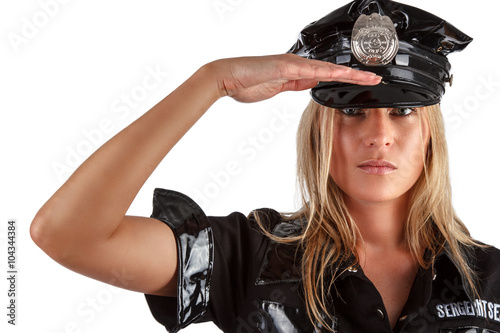 Canvas Print Serious blond woman in a police uniform.