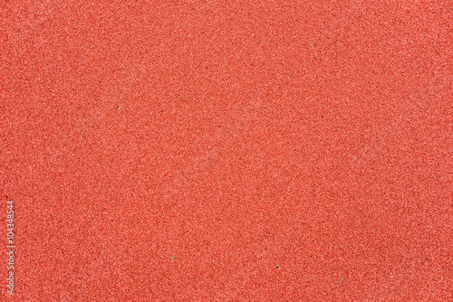Red rubber floor on playground. Background detail