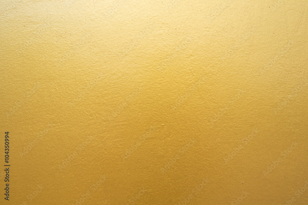 Gold concrete wall on background texture. - obrazy, fototapety, plakaty 