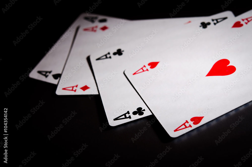 close up of four poker cards