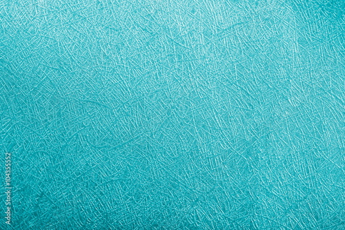 Blue ocean paper foil on background texture.
