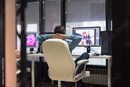 photo editor at his desk