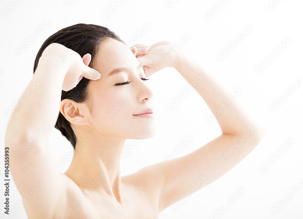 closeup young woman face with massage gesture closeup young woman face with massage gesture