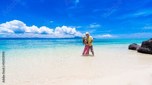 man and woman at the sea