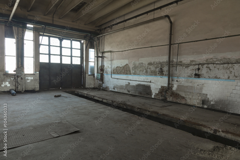 Abandoned room. Renovation needed. Grungy factory Abandoned room. Renovation needed. Grungy factory