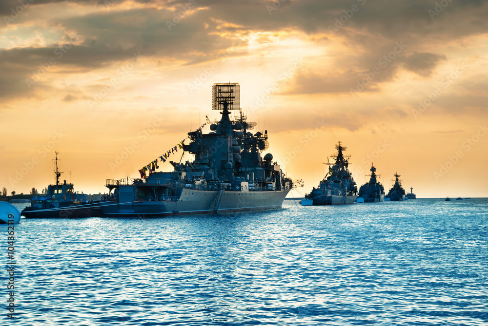 Military navy ships in a sea bay