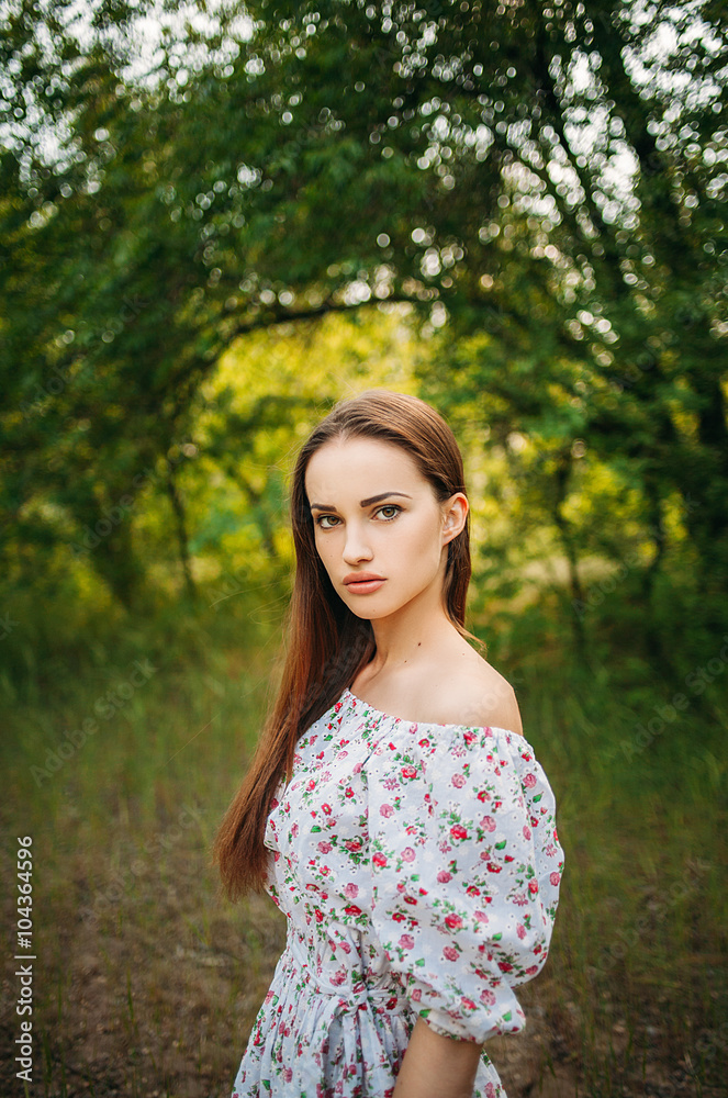 Beautiful young sensual girl with full lips. Portrait of a model on the street Beautiful young sensual girl with full lips. Portrait of a model on the street