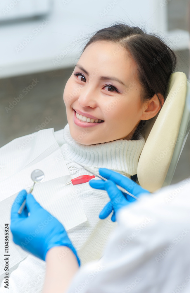 Young female patient at dentist office Young female patient at dentist office