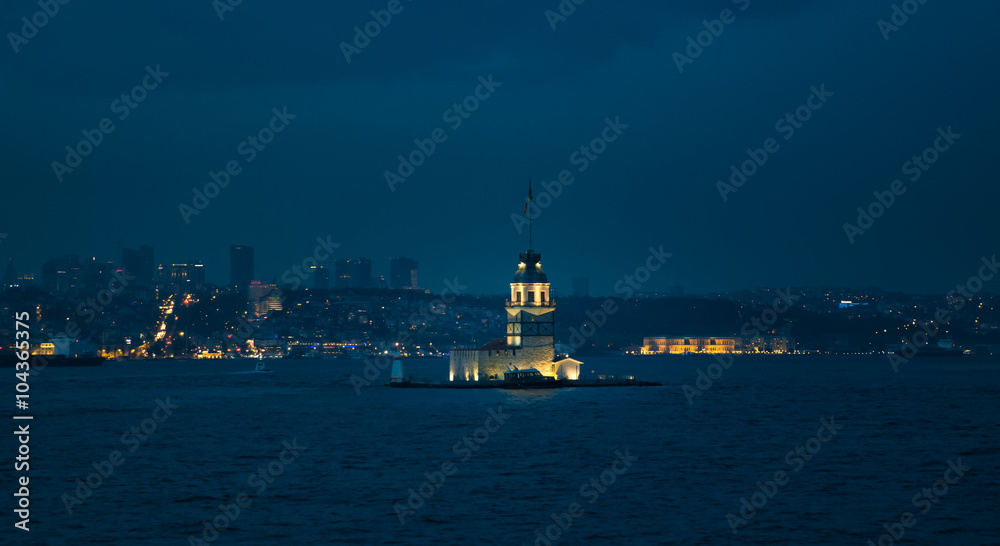 Maiden's Tower in Istanbul and the european side on the background at night