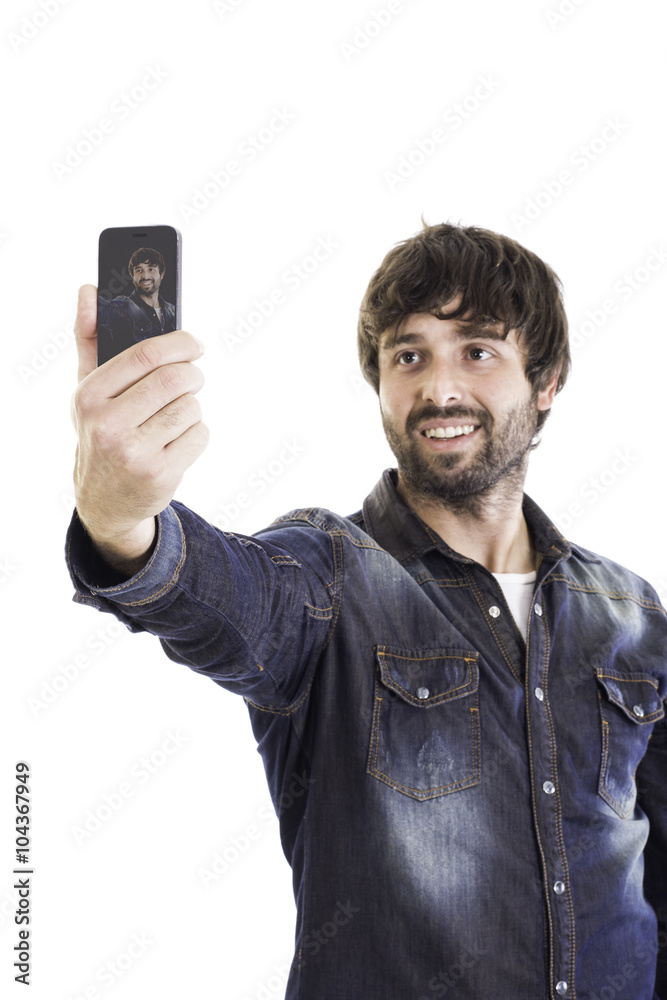 Portrait of smiling man taking photo of himself . Portrait of smiling man taking photo of himself .