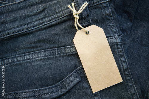 Close up of fashion jeans and lable tag