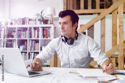 Young businessman in office