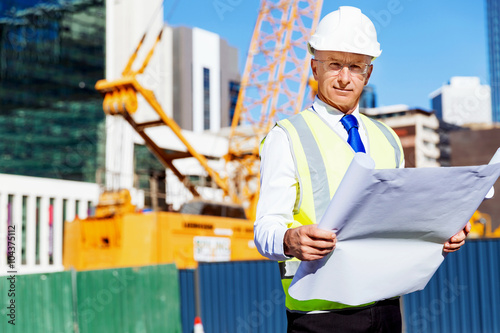 Engineer builder at construction site