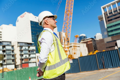 Engineer builder at construction site