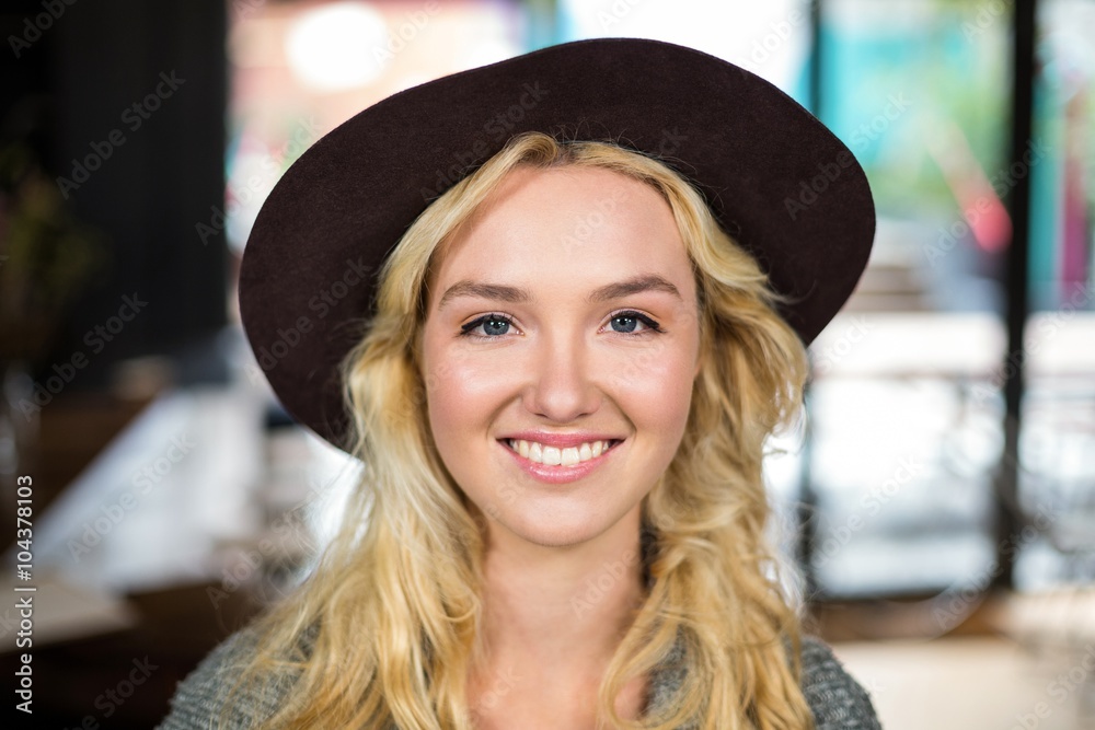 Smiling blonde with a hat Smiling blonde with a hat