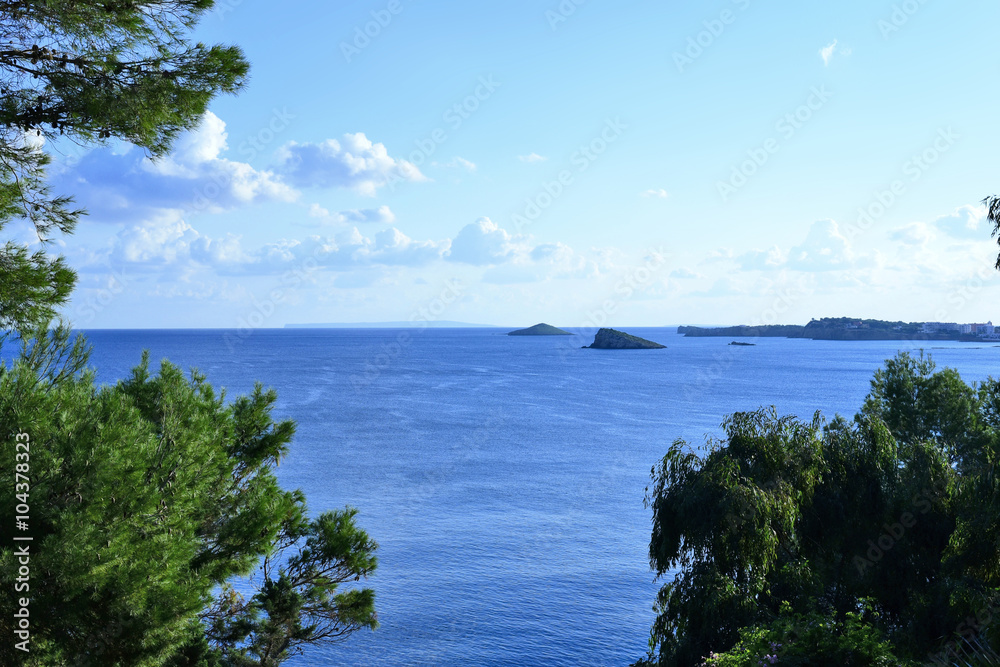 Panoramic view over the sea with offshore islands.