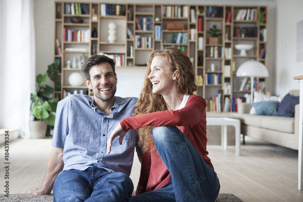 Happy couple relaxing at home Happy couple relaxing at home