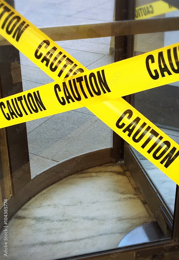 Obraz premium Yellow tape barring the way out