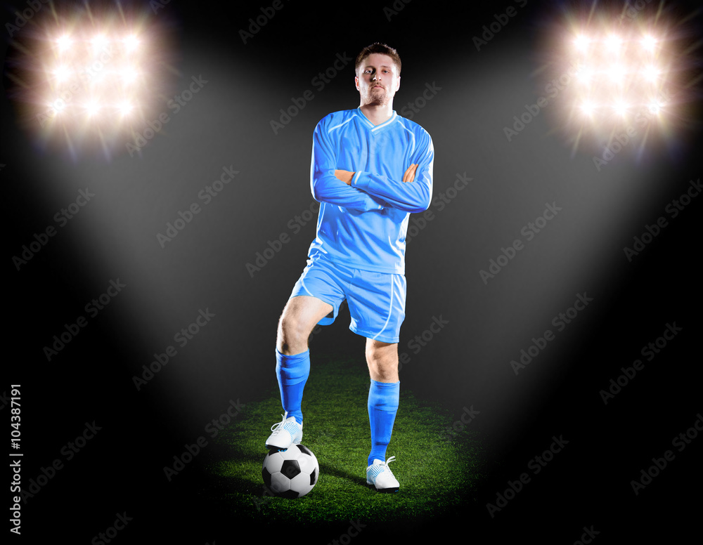 football player in blue uniform. on grass field football player in blue uniform. on grass field
