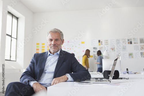 Wallpaper Mural Portrait of confident businessman in office Torontodigital.ca