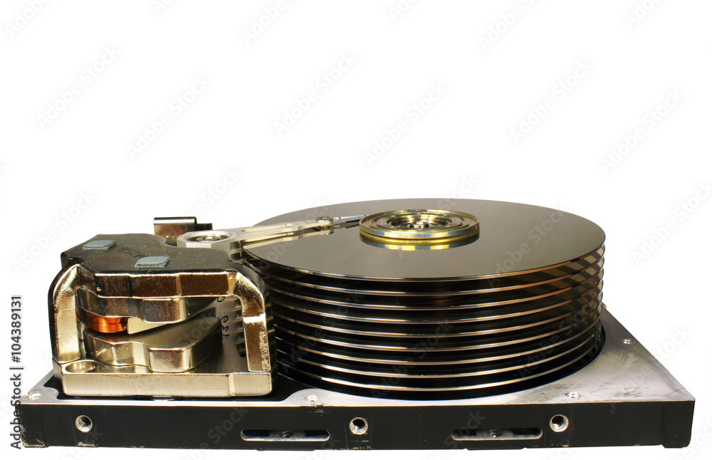Old retro open hard disk drive isolated on white background. Stack of ten  platters and magnetic heads. Voice coil actuator between powerful neodymium  magnets. Stock Photo | Adobe Stock