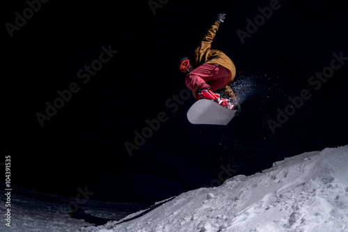 Snowboarder jumping