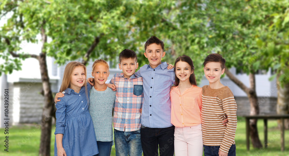 happy smiling children hugging over backyard happy smiling children hugging over backyard