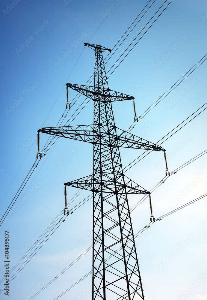 Electricity Pylon and Power Lines on Blue Sky Background Electricity Pylon and Power Lines on Blue Sky Background