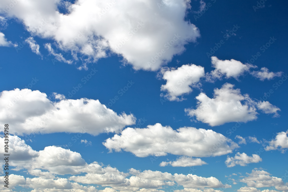 Blue sky background with tiny clouds Blue sky background with tiny clouds