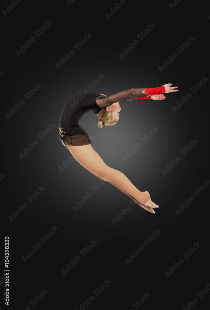 Professional gymnast  jumping in studio